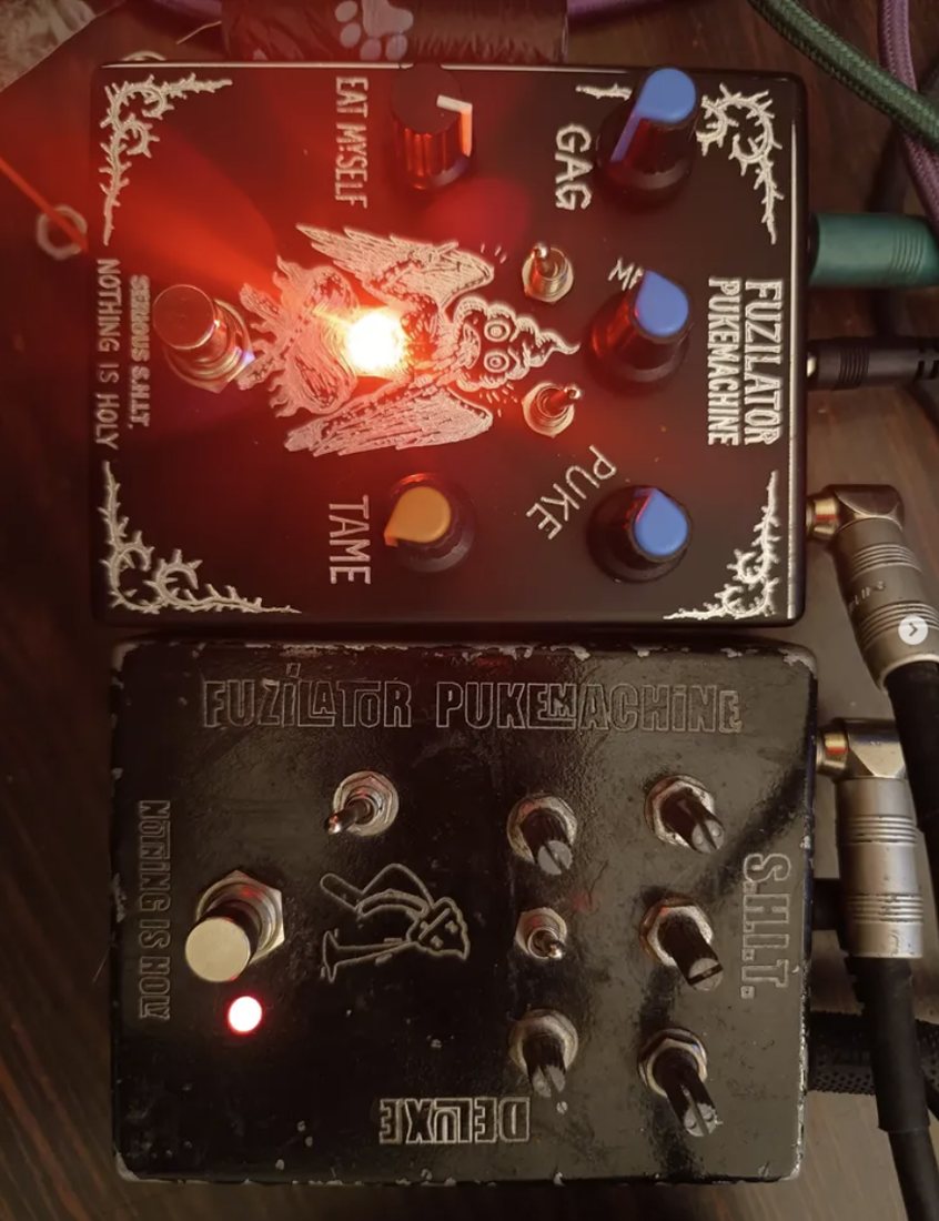 Two Fuzilators side by side, the top one lit red from inside